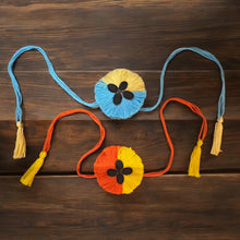 Load image into Gallery viewer, Set of 2 Plantable Two-Tone Thread Rakhis with Torai Seeds – Eco-Friendly Rakhi Gift for Brother – Sustainable Raksha Bandhan Kit