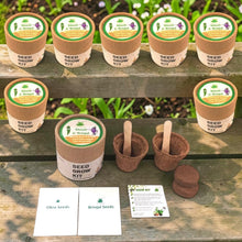 Load image into Gallery viewer, Sow and Grow® mini vegetable grow kit set with biodegradable pots, seeds, and growing medium on a wooden surface.
