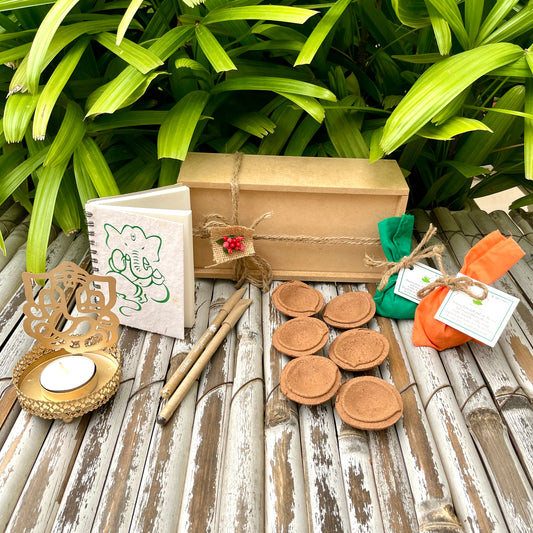Diwali Wooden Box Hamper with Tealight Holder: Plantable Mini Notepad + 2 Seed Balls + 2 Plantable Pens + Ganesha Shadow Diya Tealight Holder + Cow Dung Diyas