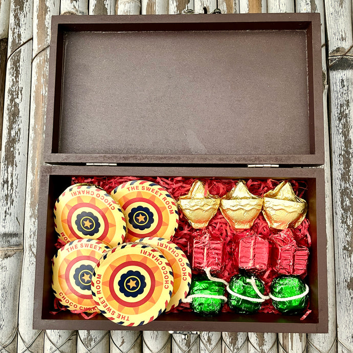 Cracker Themed Chocolates in a Wooden Box: Diya Design