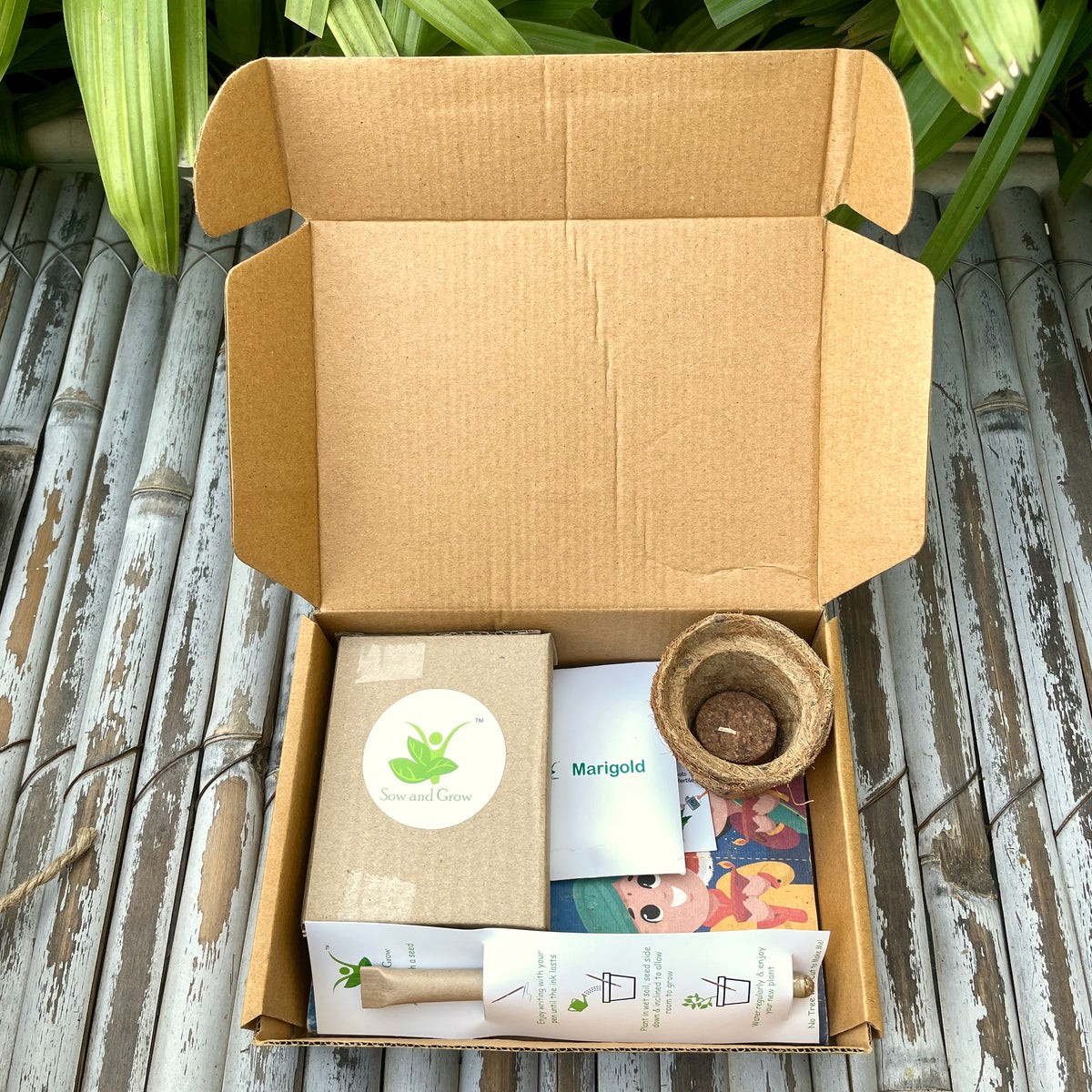 Ecofriendly Assorted Hamper:  Plantable Diary + Seed Pen + Mini Grow Kit of Marigold + Ganesha Shadow Tealight Holder
