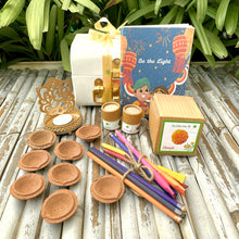 Load image into Gallery viewer, The Metal Trunk Hamper 1: Shadow Diya, Cow Dung Diyas, Mini Gardening Kit, Leafy Vegetable Seeds, Plantable Stationary
